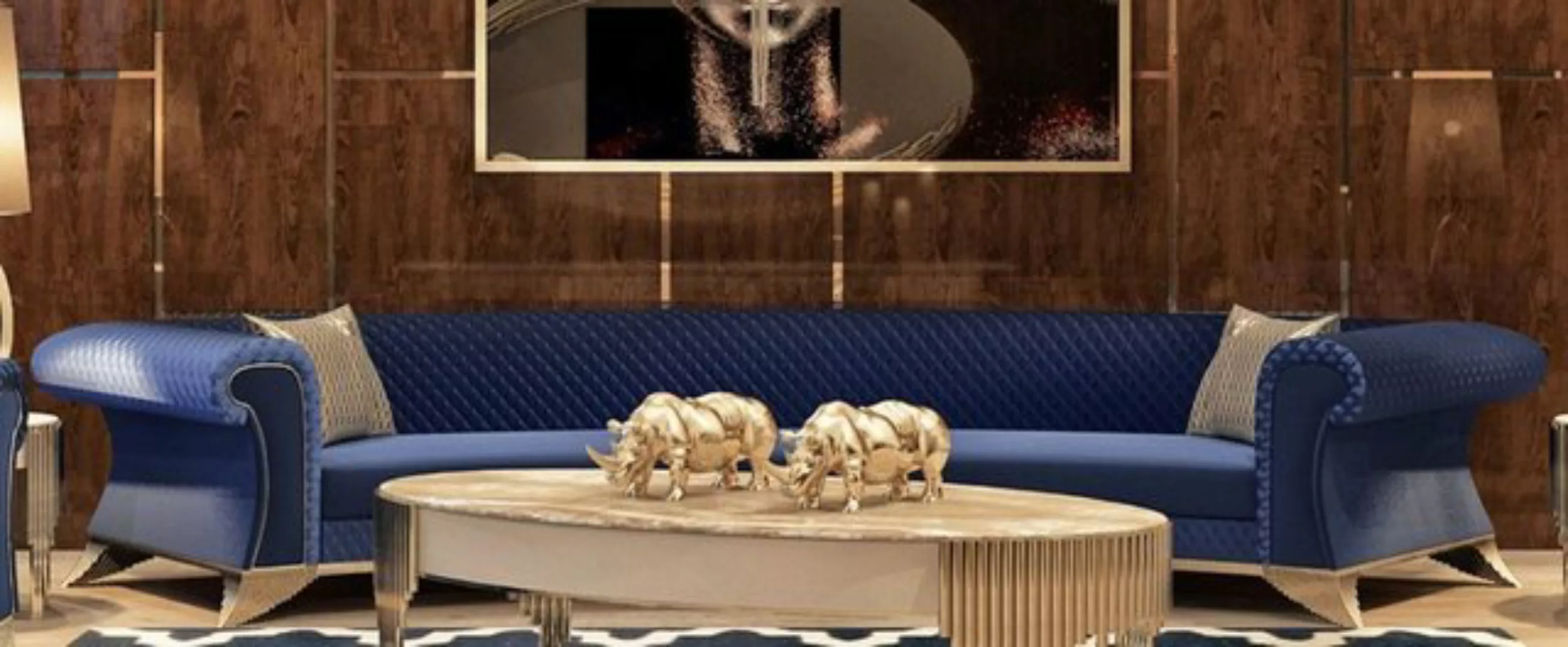 Casa Padrino Sofa Luxus Art Deco Sofa Blau / Gold - Gebogenes Wohnzimmer So günstig online kaufen