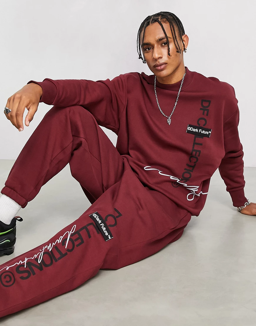 ASOS Dark Future – Oversize-Sweatshirt in Burgunderrot mit mehreren Logos günstig online kaufen