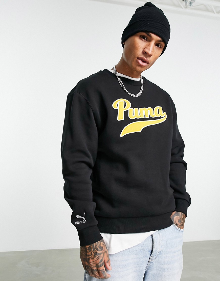 PUMA – Sweatshirt in Schwarz und Gelb mit College-Logo günstig online kaufen
