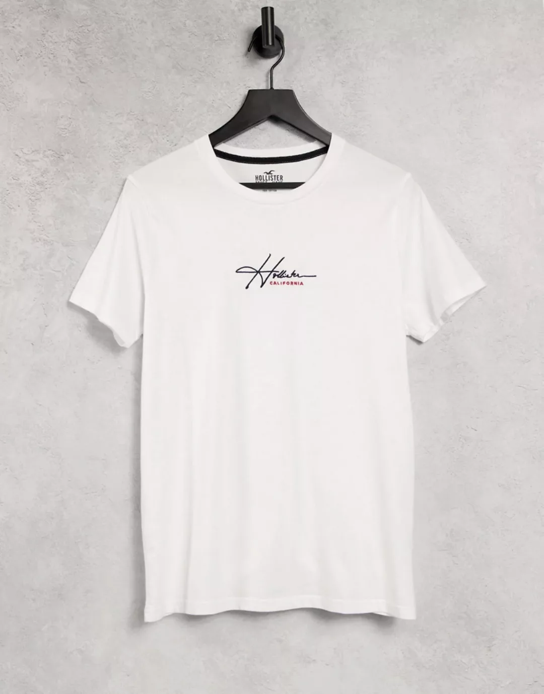 Hollister – T-Shirt mit mittigem Logoschriftzug in Weiß günstig online kaufen