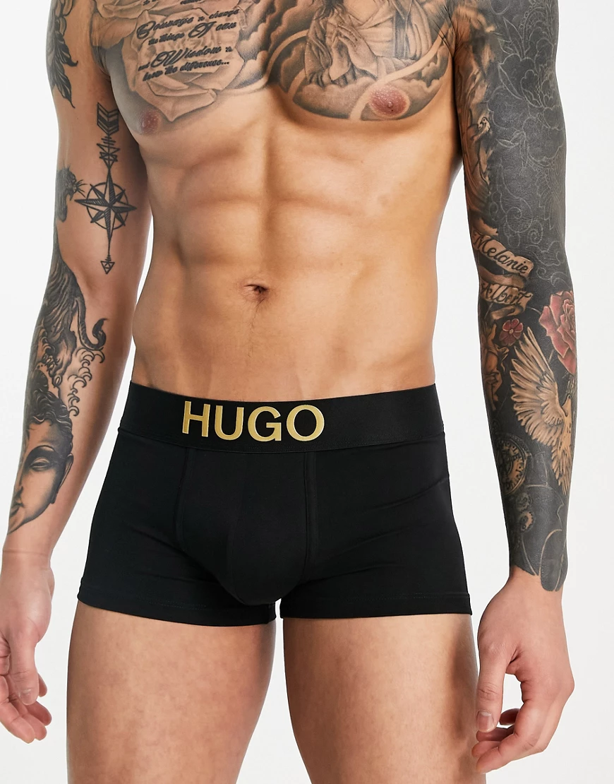 Hugo – Badehose in Schwarz mit goldenem Logo günstig online kaufen