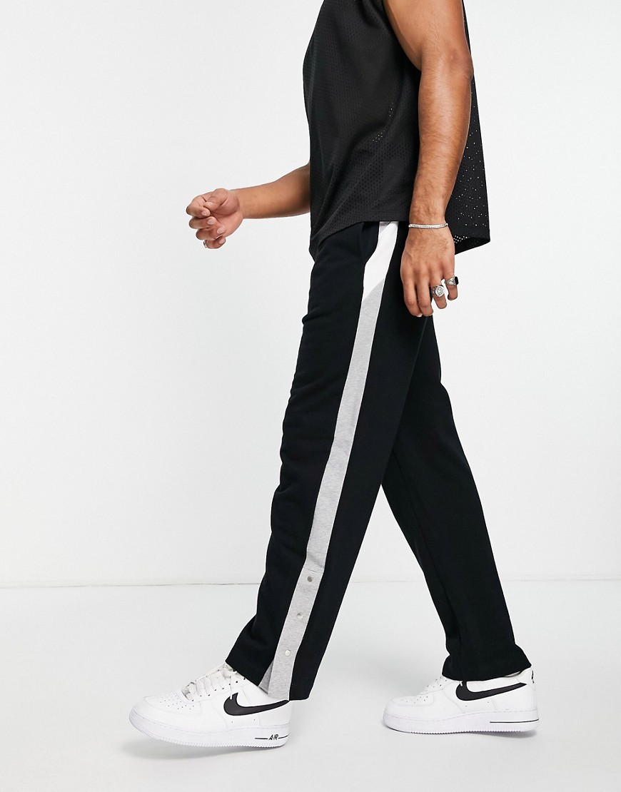 ASOS DESIGN – Oversize-Jogginghose in Schwarz mit seitlichen Einsätzen günstig online kaufen