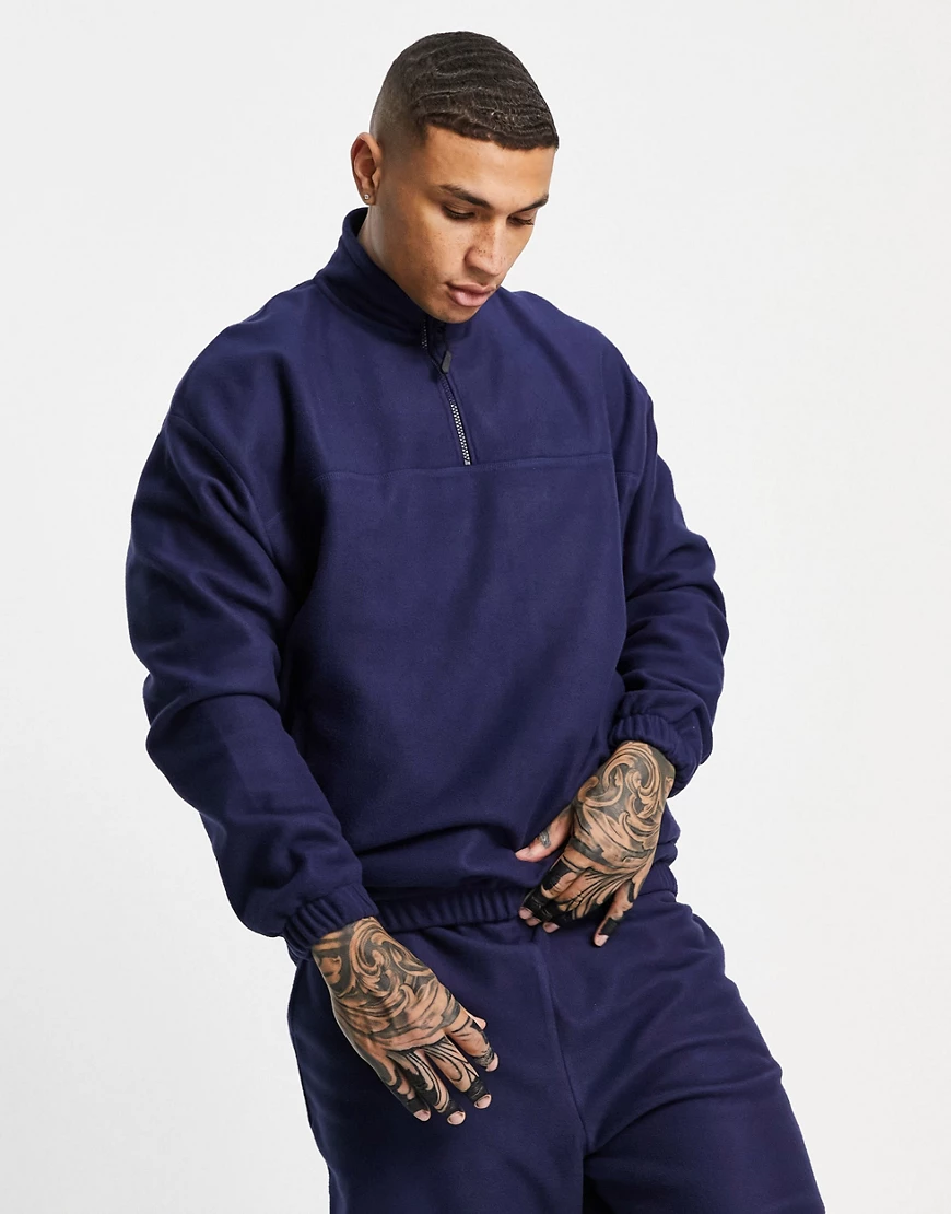 ASOS DESIGN – Oversize-Sweatshirt aus Polarfleece in Marineblau mit kurzem günstig online kaufen