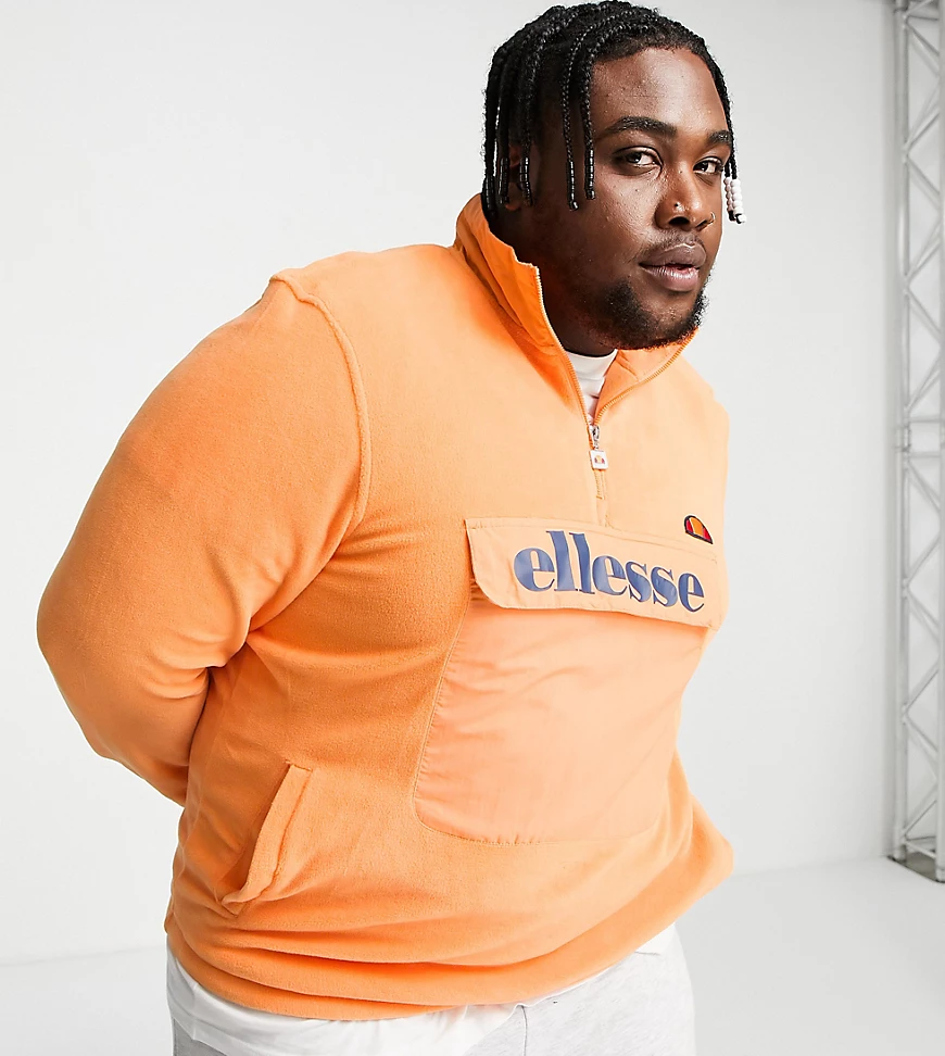 ellesse PLUS – Fleece-Oberteil in Orange mit kurzem Reißverschluss günstig online kaufen