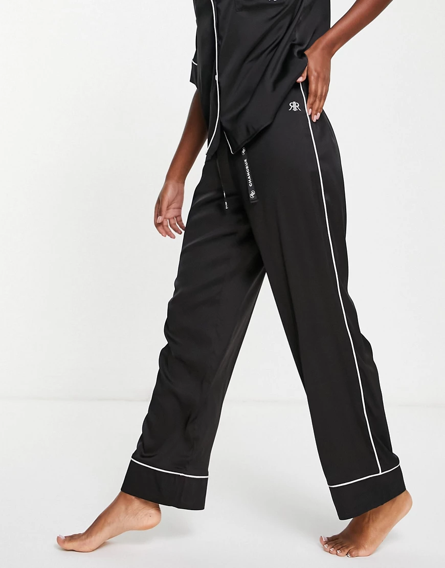 River Island – Pyjama-Hose aus Satin in Schwarz mit Paspelierung günstig online kaufen