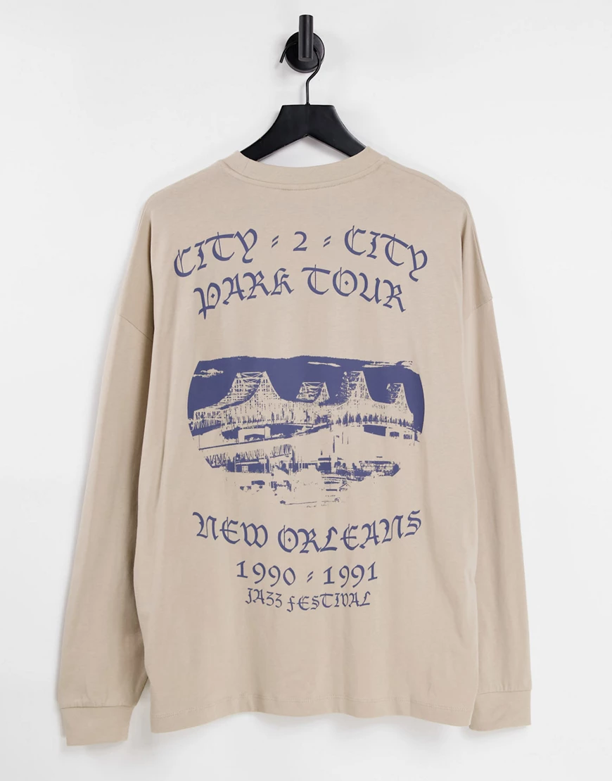 ASOS DESIGN – Langärmliges Oversize-Shirt in Beige mit „New Orleans“-Print günstig online kaufen