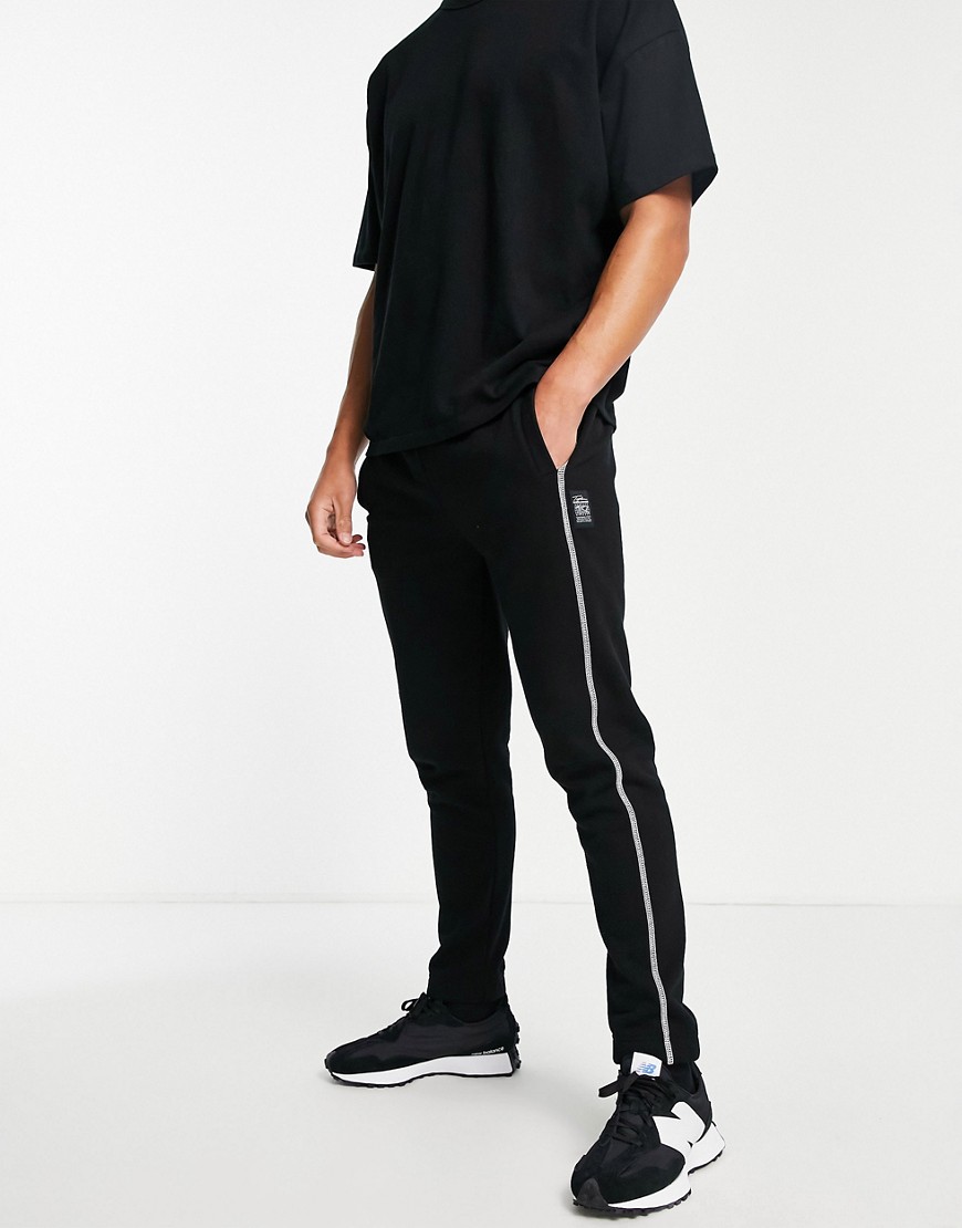 Topman – Signature – Jogginghose in Schwarz mit Kontrastnaht günstig online kaufen