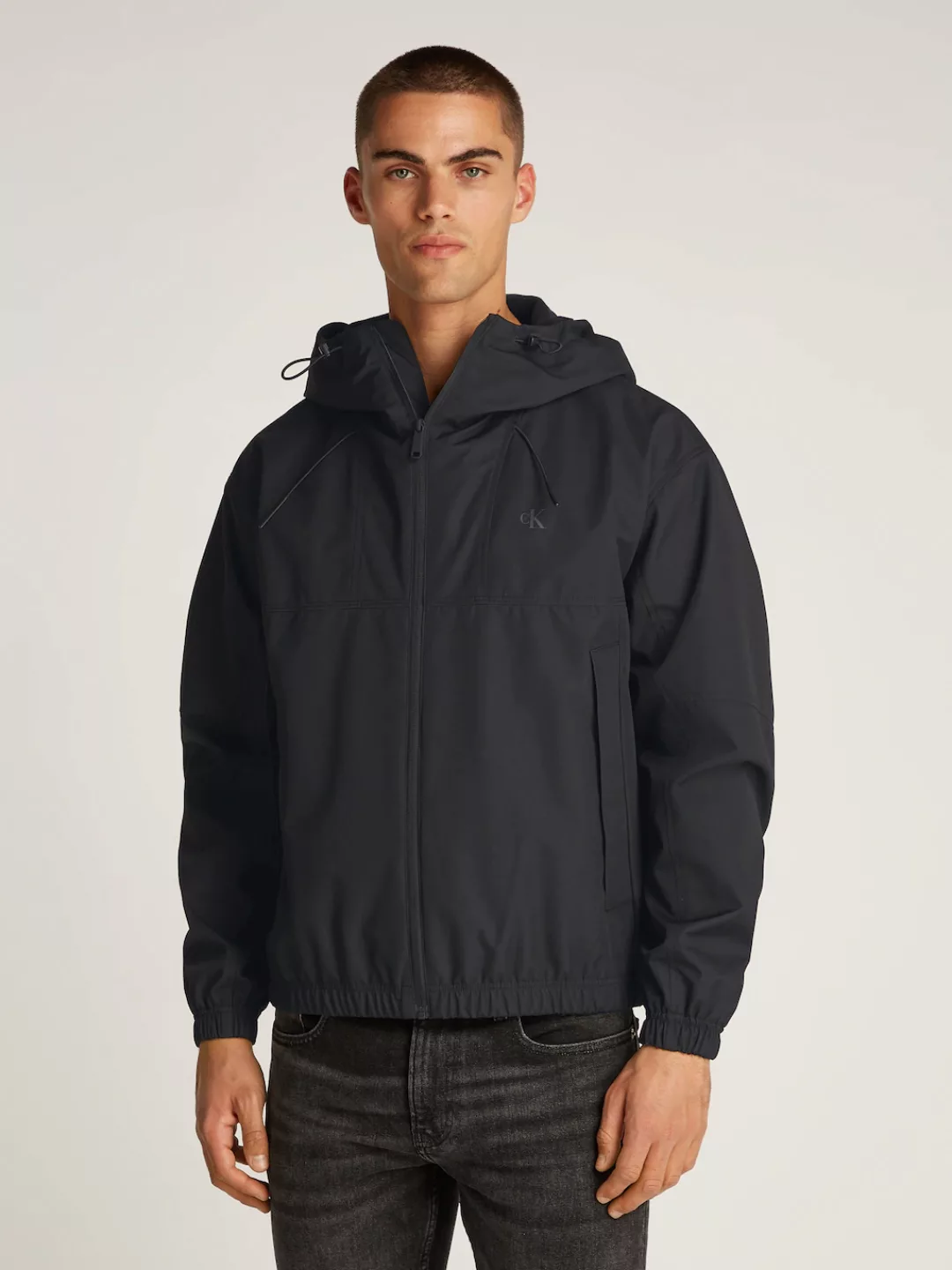 Calvin Klein Jeans Allwetterjacke "TECHNICAL JACKET", mit Kapuze, Logodruck günstig online kaufen