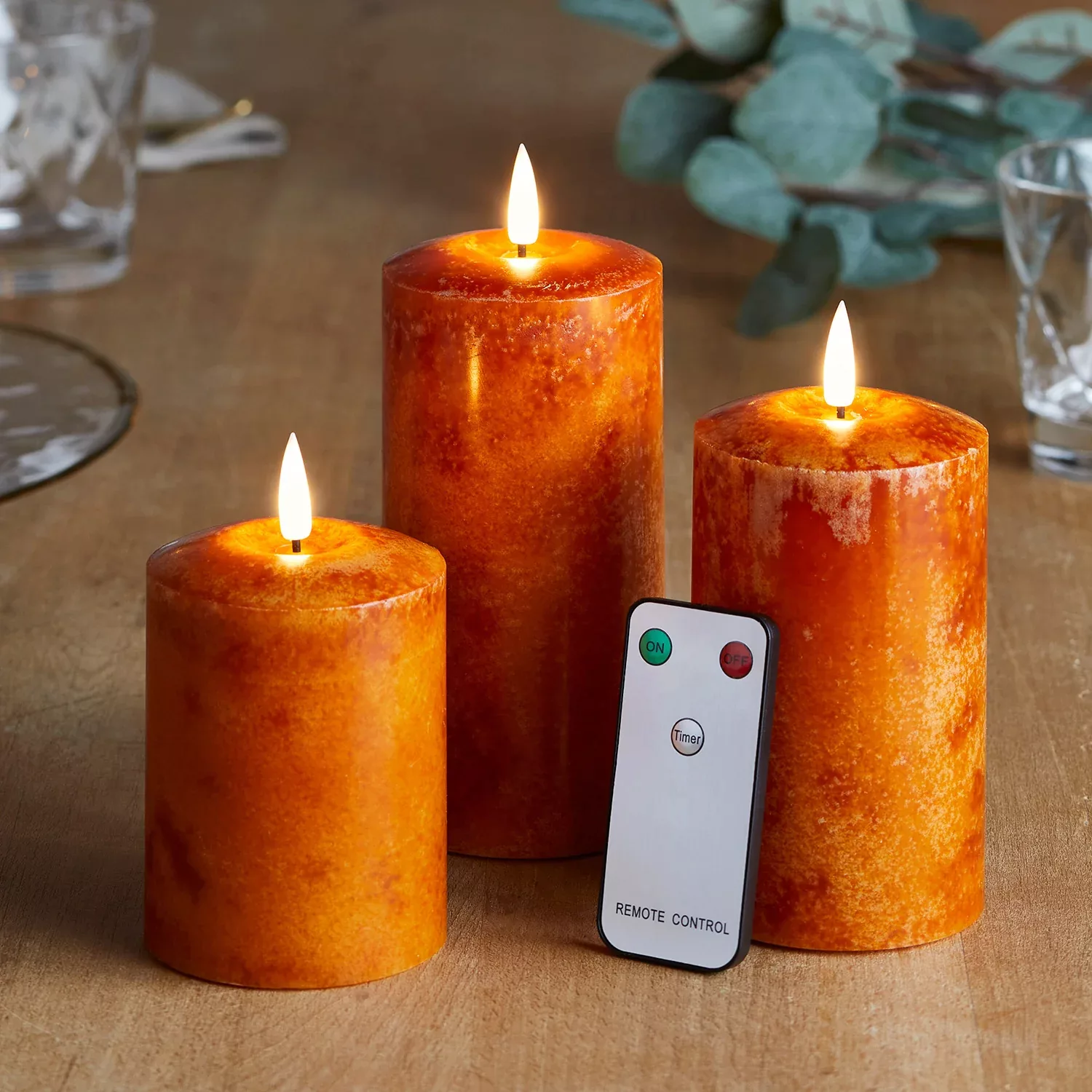 TruGlow® LED Echtwachskerzen Trio orange mit Fernbedienung günstig online kaufen