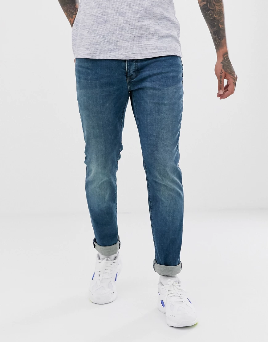 Topman – Schmale Stretch-Jeans aus Bio-Baumwollmischung in mittelblauer Was günstig online kaufen