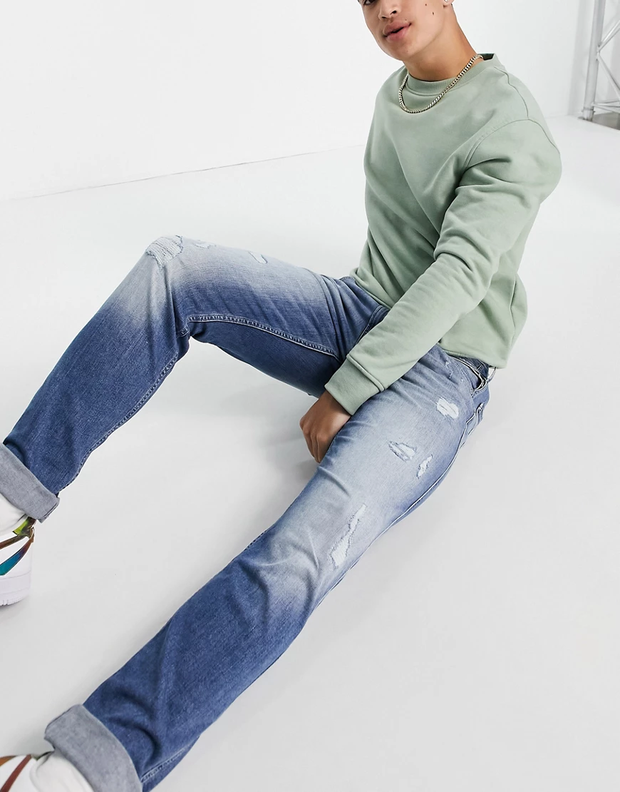 Replay – Anbass 573 Bio – Jeans mit schmalem Schnitt in Used-Optik-Blau günstig online kaufen