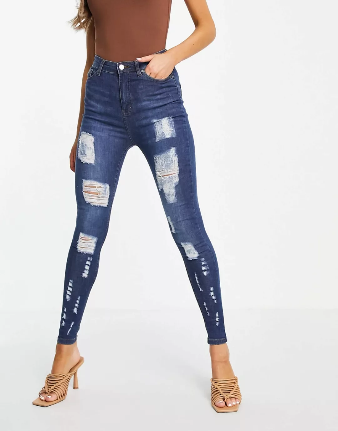 NaaNaa – Jeans in Blau mit Zierrissen günstig online kaufen