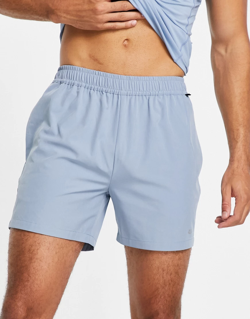 ASOS 4505 – Mittellange Sport-Shorts in Staubblau mit Logo günstig online kaufen