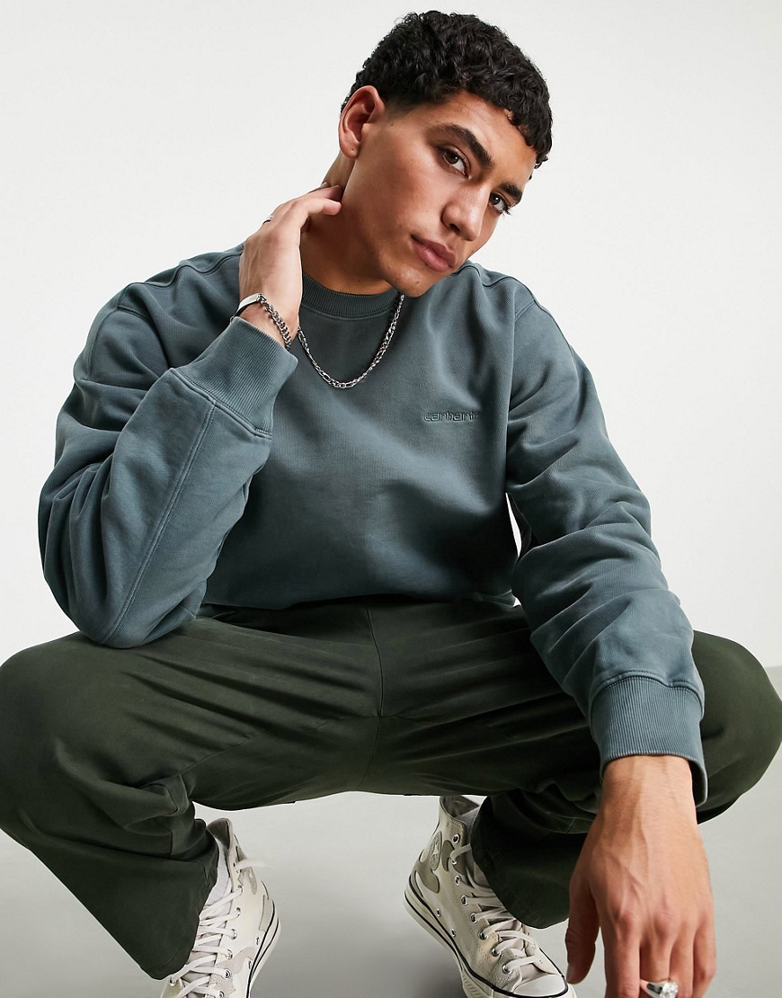 Carhartt WIP – Ashfield – Sweatshirt in Grün mit Acid-Waschung günstig online kaufen