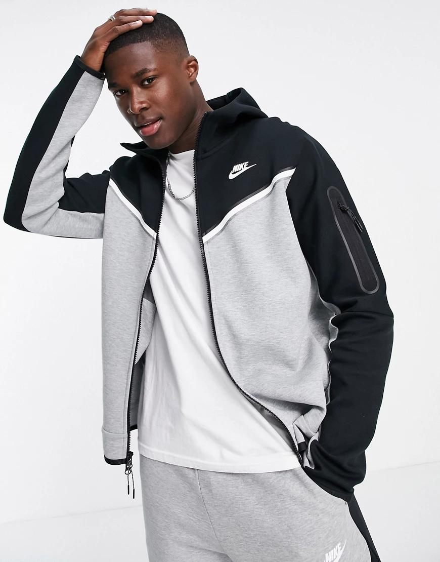 Nike – Kapuzenjacke aus Tech-Fleece in Schwarz und Grau mit Blockfarbendesi günstig online kaufen