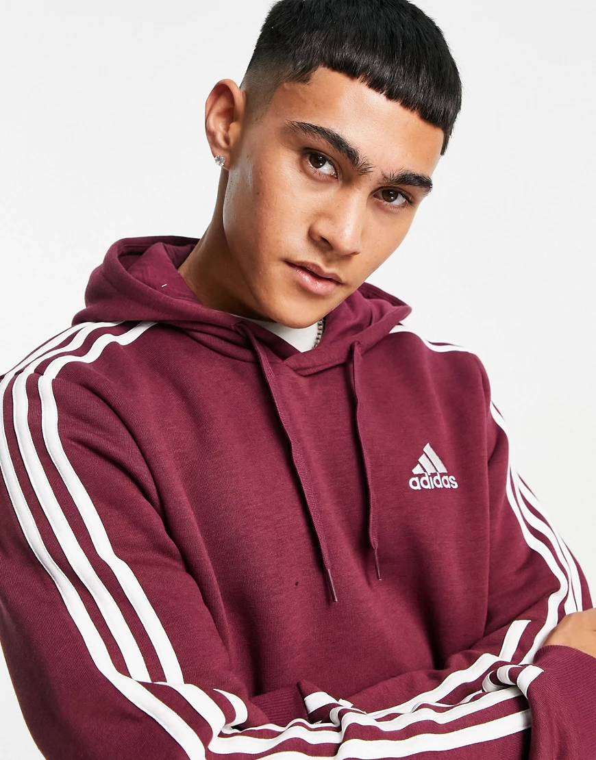 adidas – ZNE – Kapuzenpullover in Burgunderrot mit drei Streifen günstig online kaufen