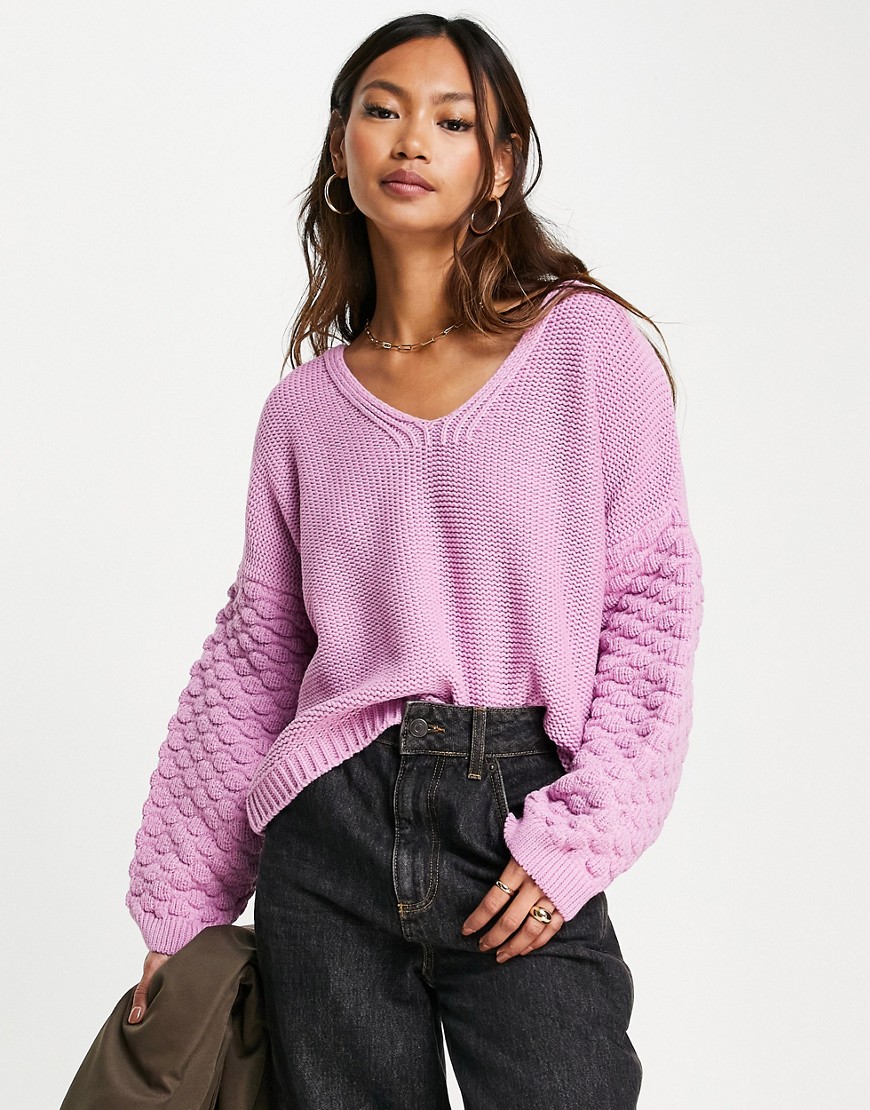 ASOS DESIGN – Pullover in Rosa mit V-Ausschnitt und strukturierten Ärmeln günstig online kaufen