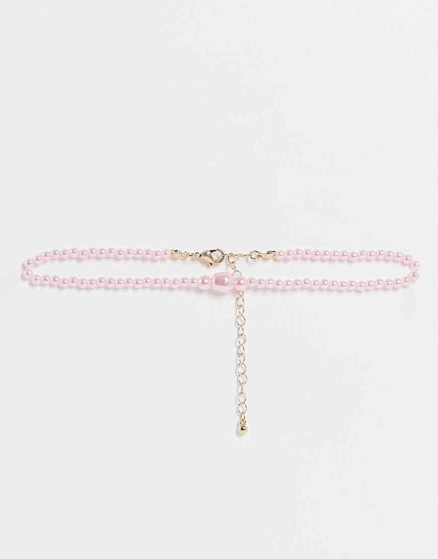 ASOS DESIGN – Eng anliegende Halskette mit unterschiedlich großen rosa Kuns günstig online kaufen