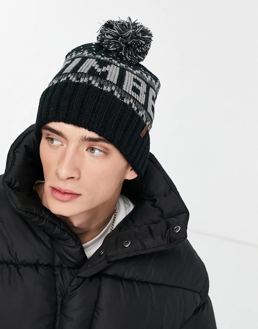 Timberland – Knit In – Strickmütze in Schwarz mit Umschlag günstig online kaufen