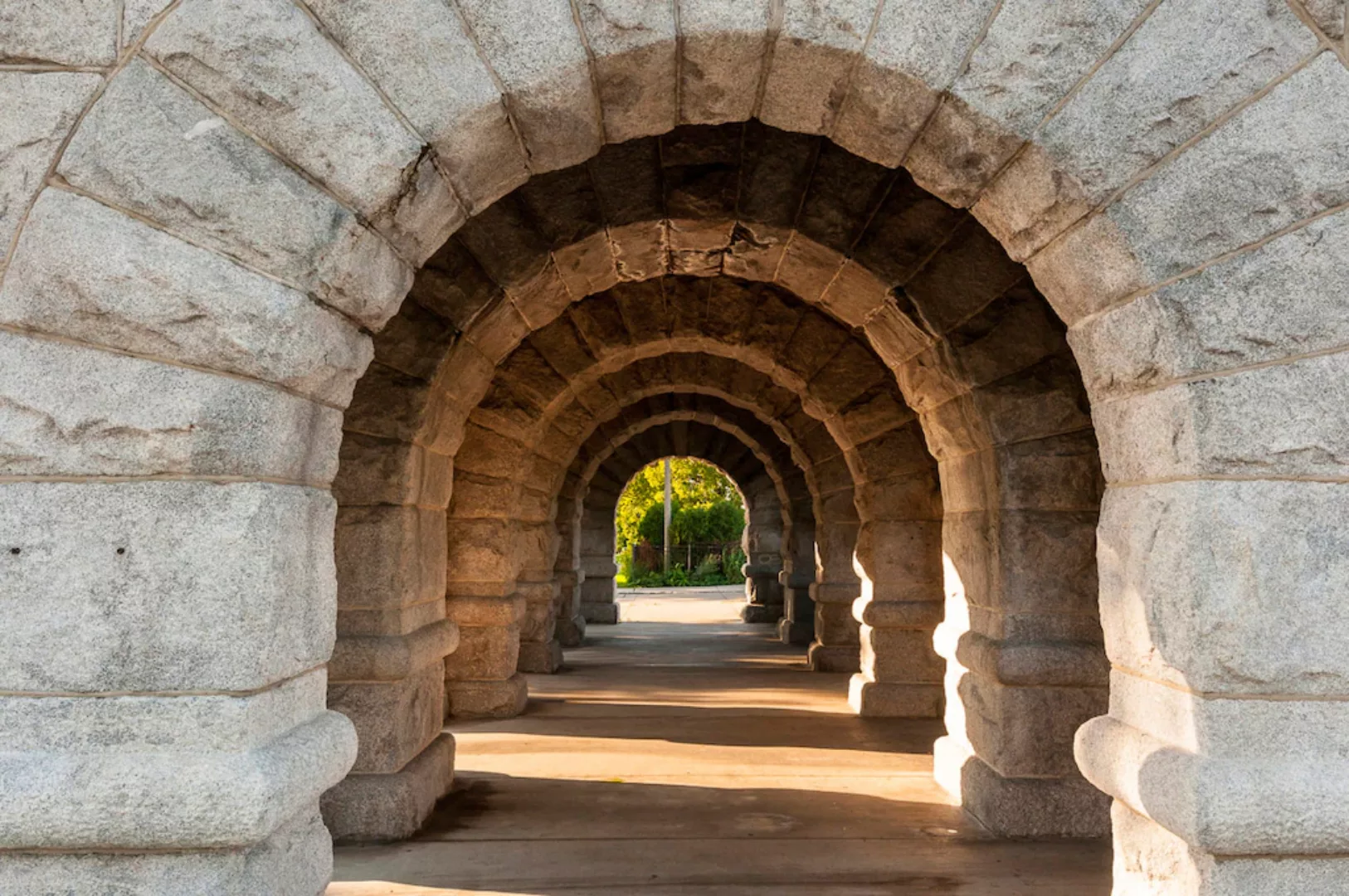 Papermoon Fototapete »TUNNEL-STEINWAND STEINMAUER STEINE STRUKTUR ALLEE DEK günstig online kaufen