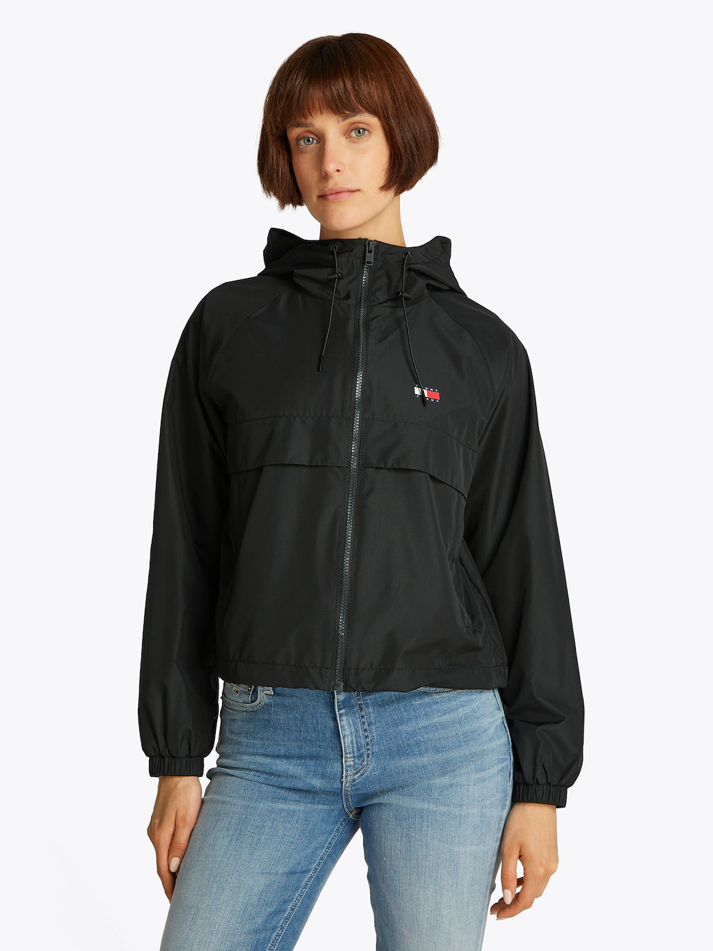 Tommy Jeans Windbreaker "TJW ESSENTIAL WINDBREAKER EXT", mit Kapuze, mit Lo günstig online kaufen