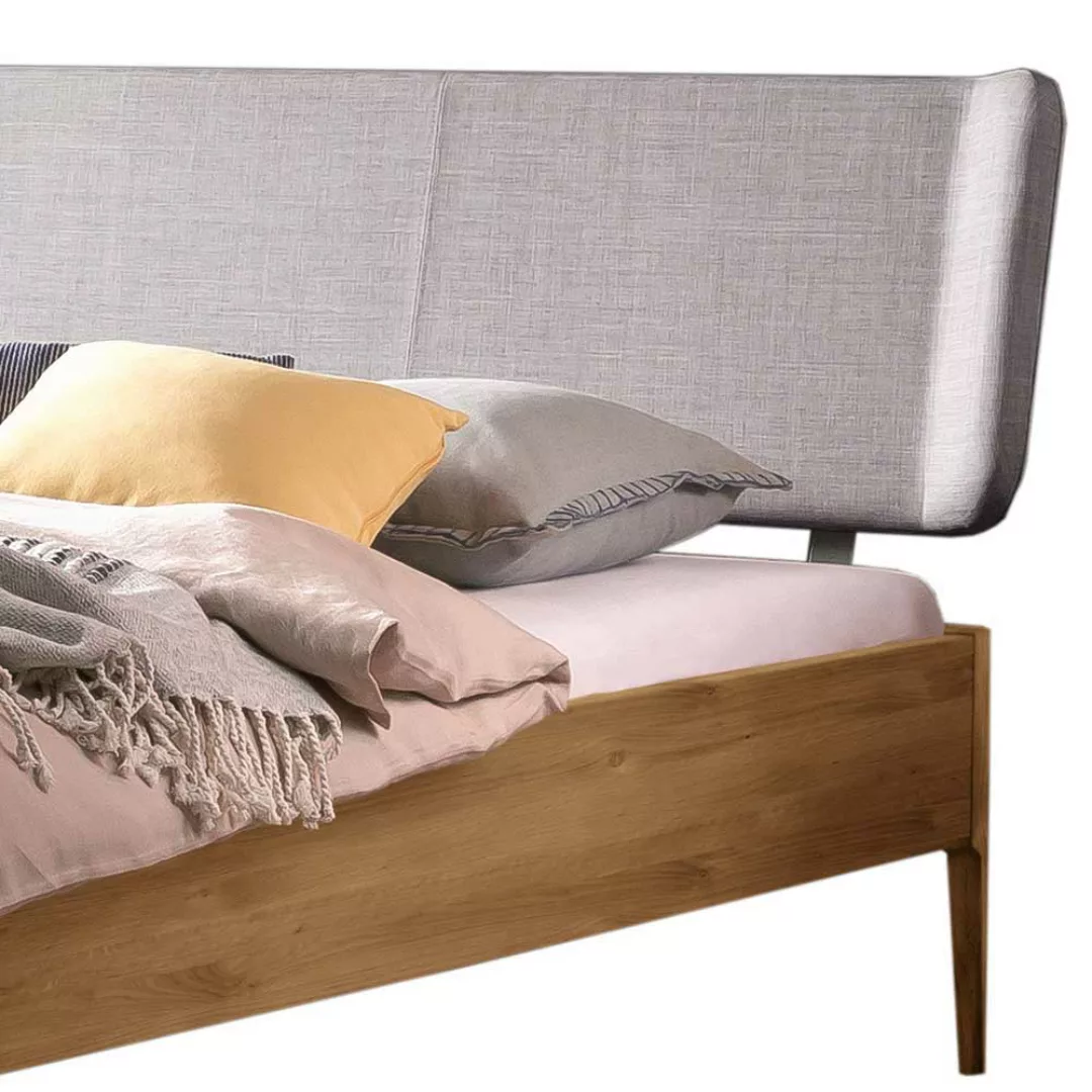 Wildeiche massiv Doppelbett in modernem Design mit Polsterkopfteil in Grau günstig online kaufen
