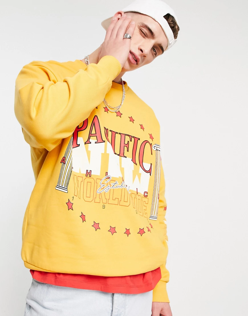ASOS DESIGN – Oversized-Sweatshirt in Orange mit College-Print günstig online kaufen