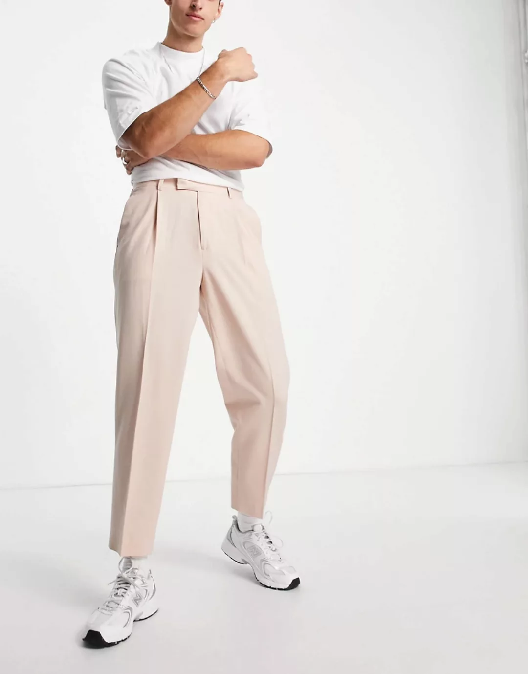 ASOS DESIGN – Schmal zulaufende, elegante Oversize-Hose in der Farbe Stein- günstig online kaufen