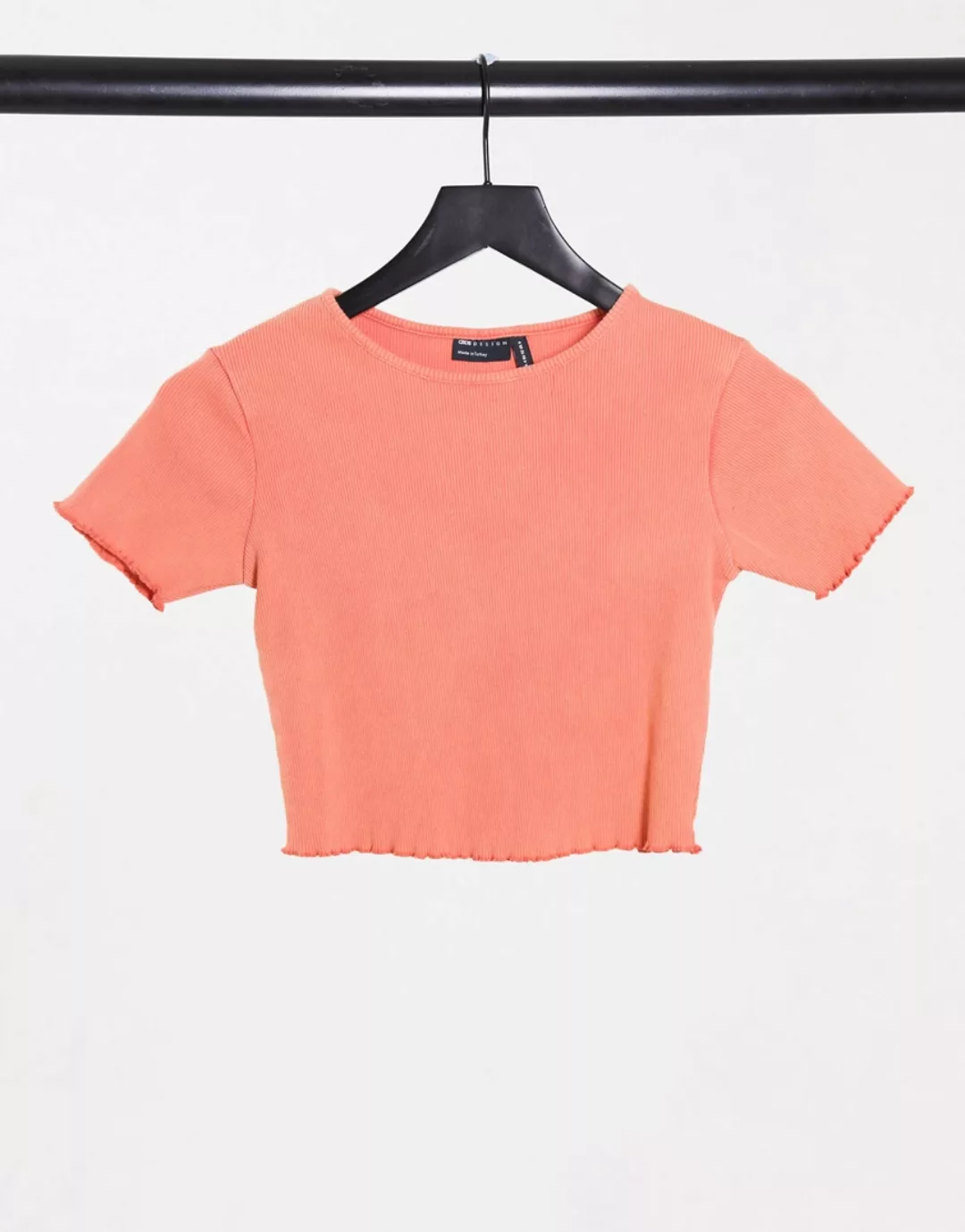 ASOS Design – Kurzes T-Shirt mit gekräuseltem Saum in verwaschenem Korallen günstig online kaufen