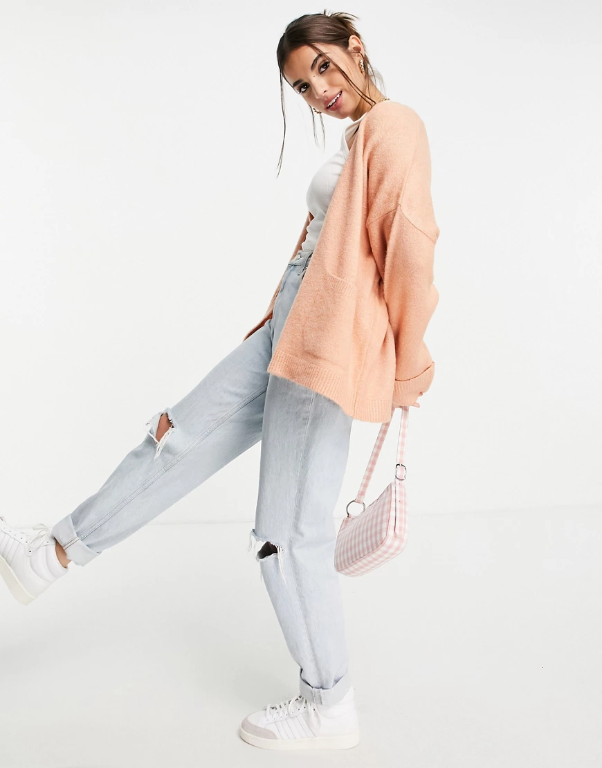 ASOS DESIGN – Oversize-Strickjacke in Rosé mit umgeschlagenen Bündchen und günstig online kaufen