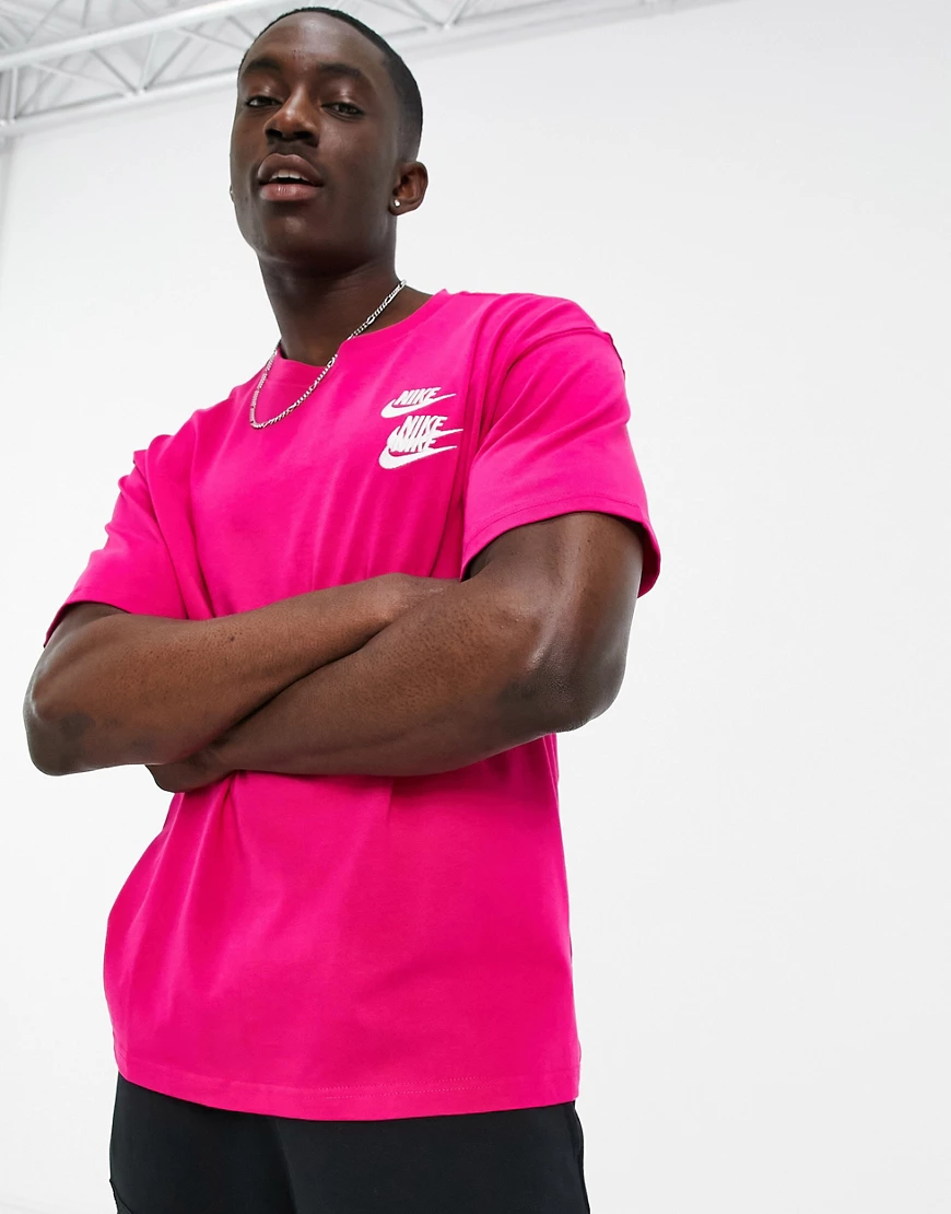Nike – World Tour Pack – Oversize-T-Shirt mit Grafik in Rosa günstig online kaufen