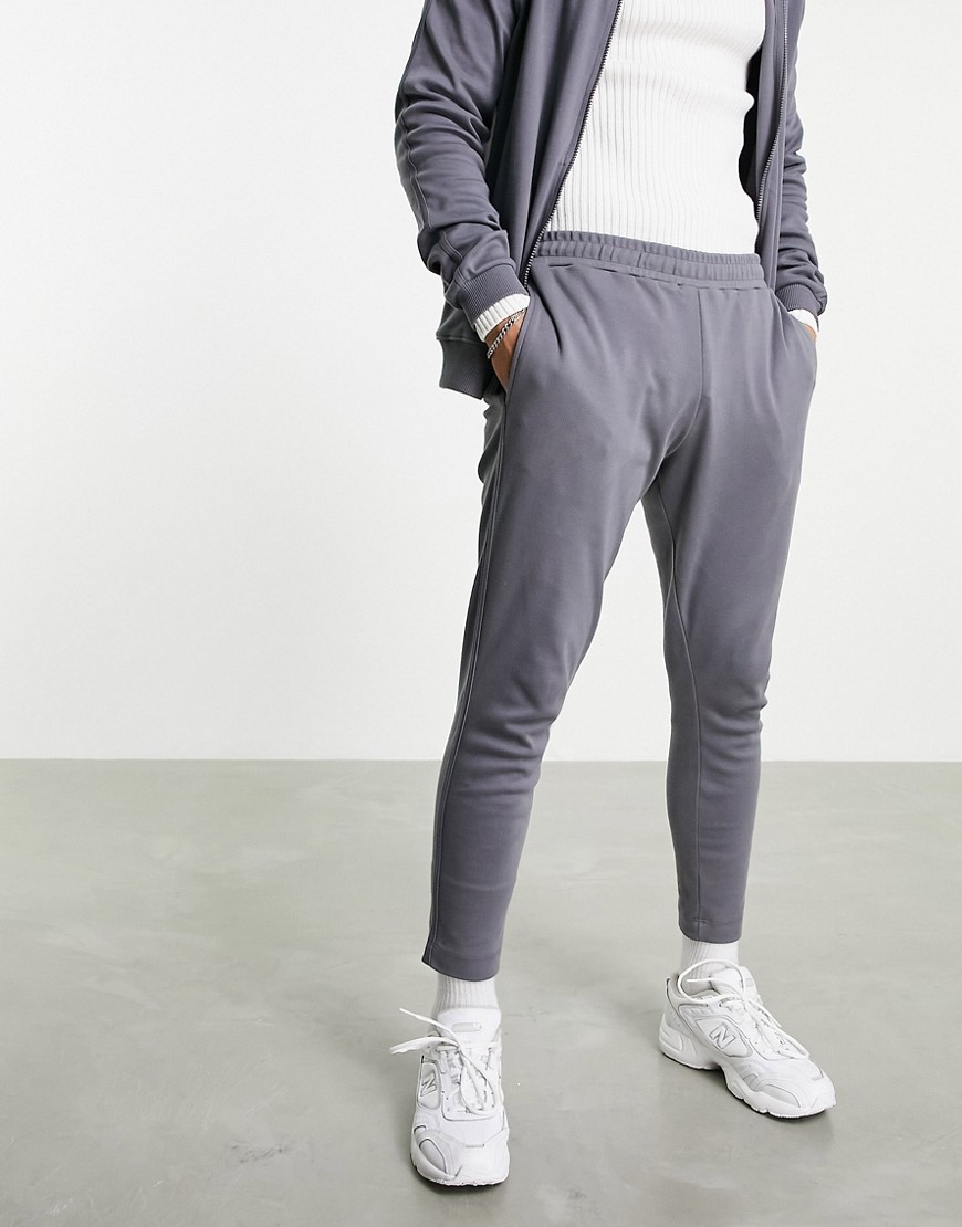 ASOS DESIGN – Jogginghose aus Neoprenmaterial mit schmalem Schnitt und Jacq günstig online kaufen