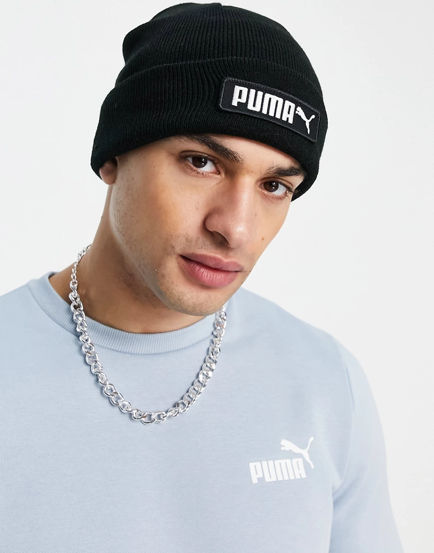 Puma – Strickmütze in Schwarz mit Logo günstig online kaufen