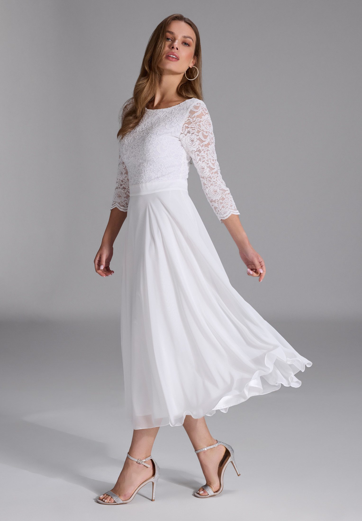 SWING Cocktailkleid Taillierter Schnitt mit ausgestelltem günstig online kaufen