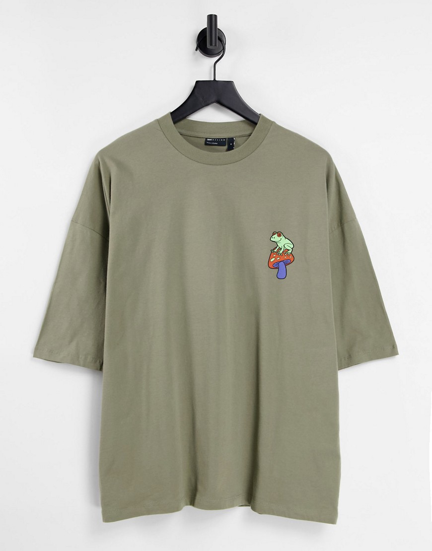 ASOS DESIGN – Oversize-T-Shirt aus Bio-Baumwolle in Khaki mit Frosch-Cartoo günstig online kaufen