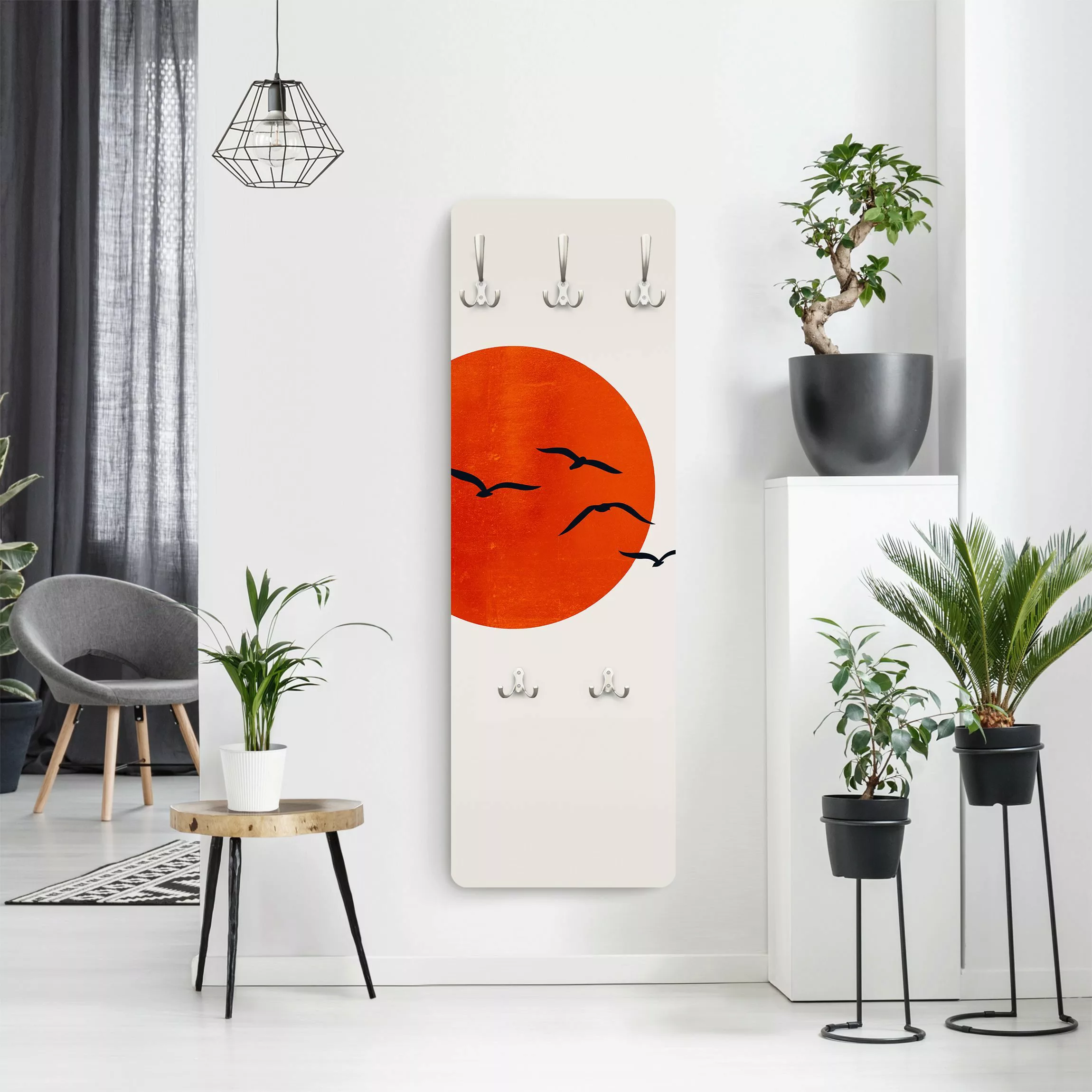Wandgarderobe Holzpaneel Vogelschwarm vor roter Sonne I günstig online kaufen