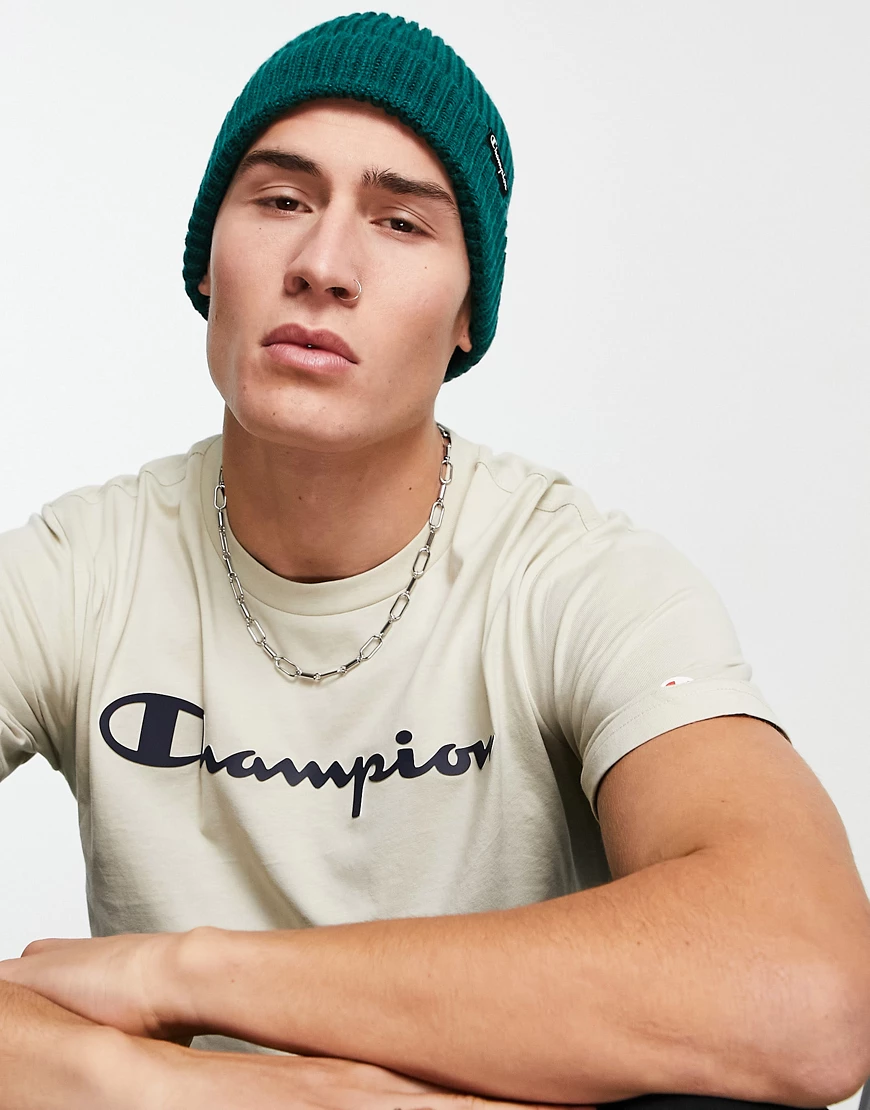 Champion – Strickmütze in Grün mit Logoschriftzug günstig online kaufen