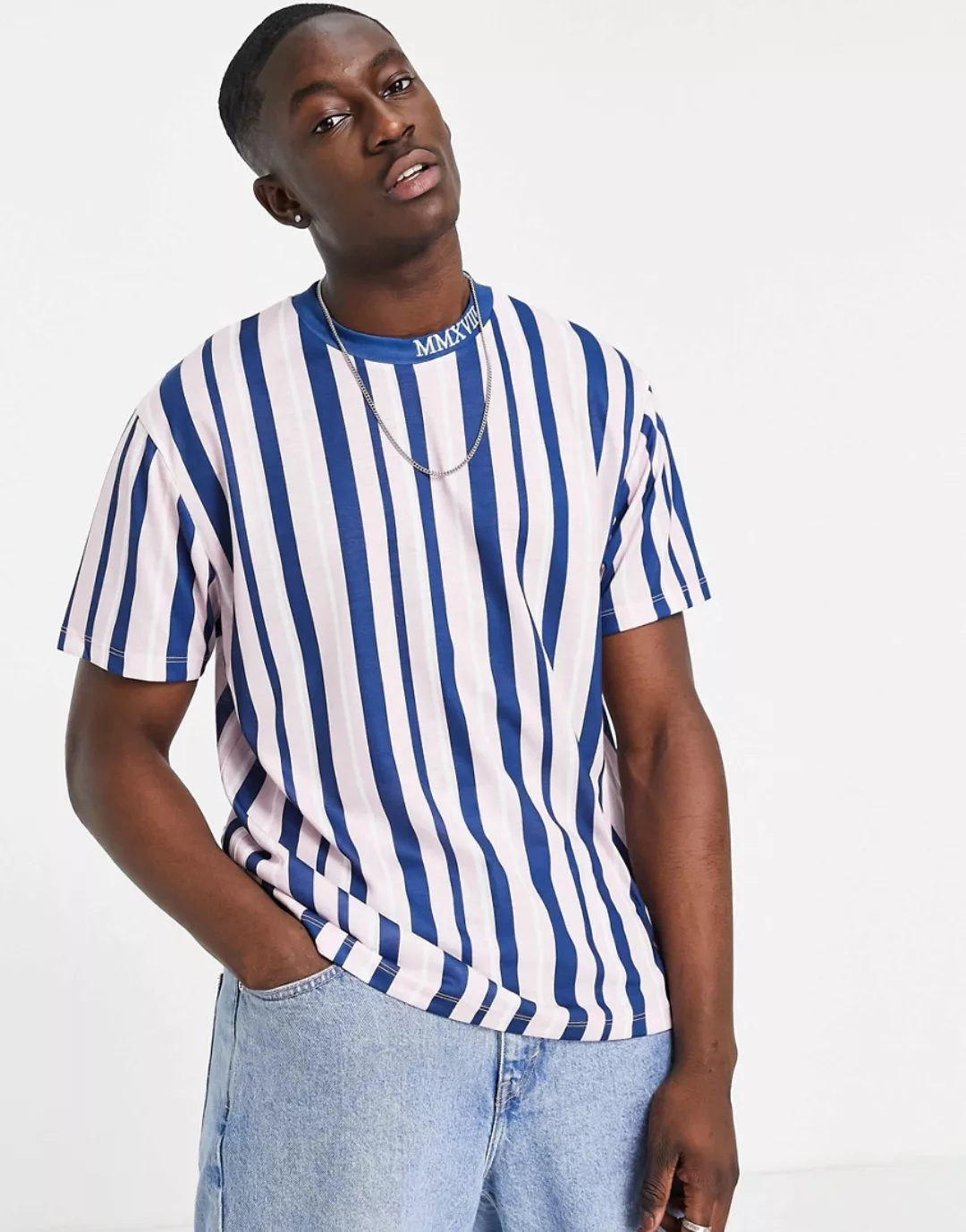 ASOS DESIGN – Locker geschnittenes T-Shirt in Rosa und Marineblau mit Strei günstig online kaufen