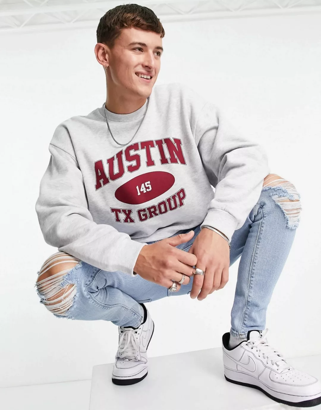 ASOS DESIGN – Oversize-Sweatshirt in Weiß meliert mit großem College-Print günstig online kaufen