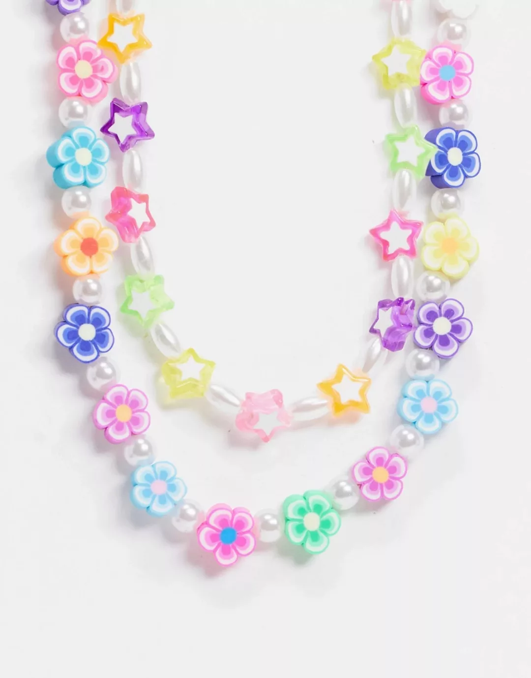 ASOS DESIGN – Halsketten mit Sternen, Blumen und Perlen im 2er-Pack-Mehrfar günstig online kaufen