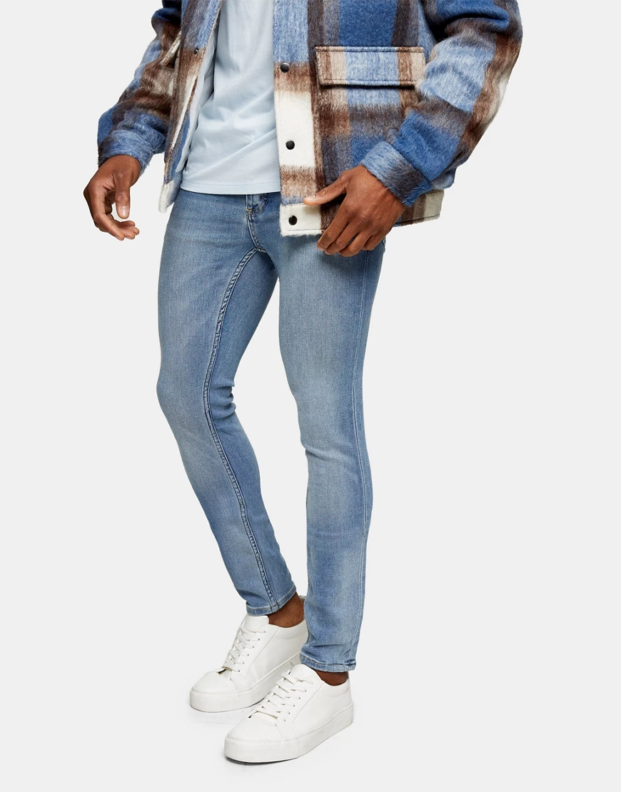 Topman – Hautenge Jeans aus Bio-Baumwollmischung in heller Waschung-Blau günstig online kaufen