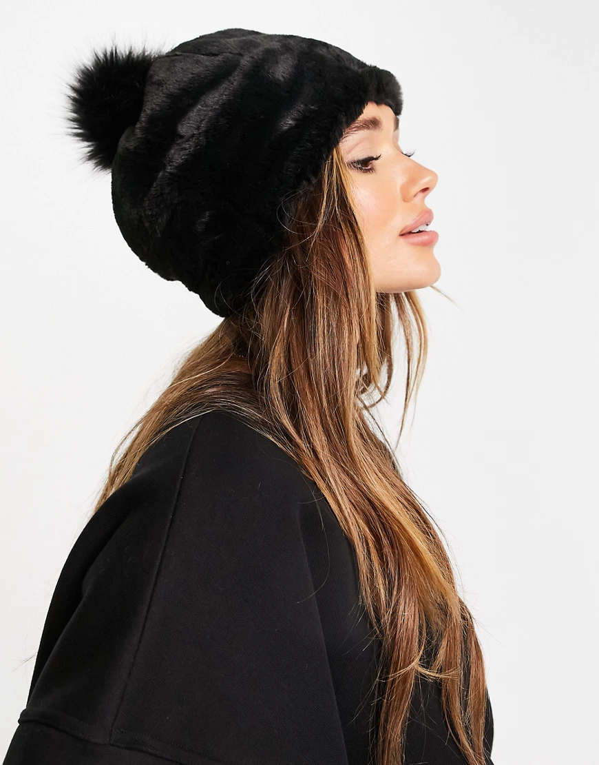 UGG – Mütze aus Kunstfell in Schwarz mit Bommel günstig online kaufen