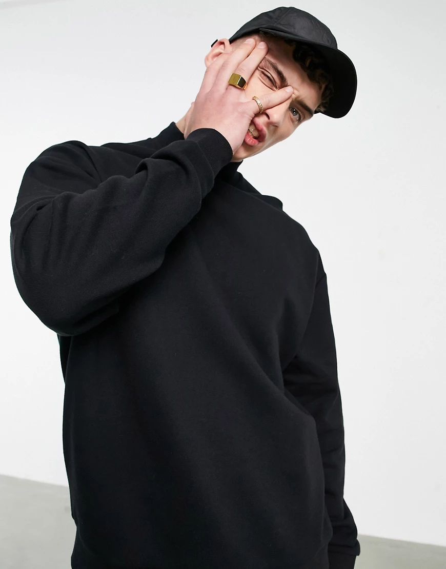 ASOS DESIGN – Oversized-Sweatshirt in Schwarz mit Rollkragen günstig online kaufen