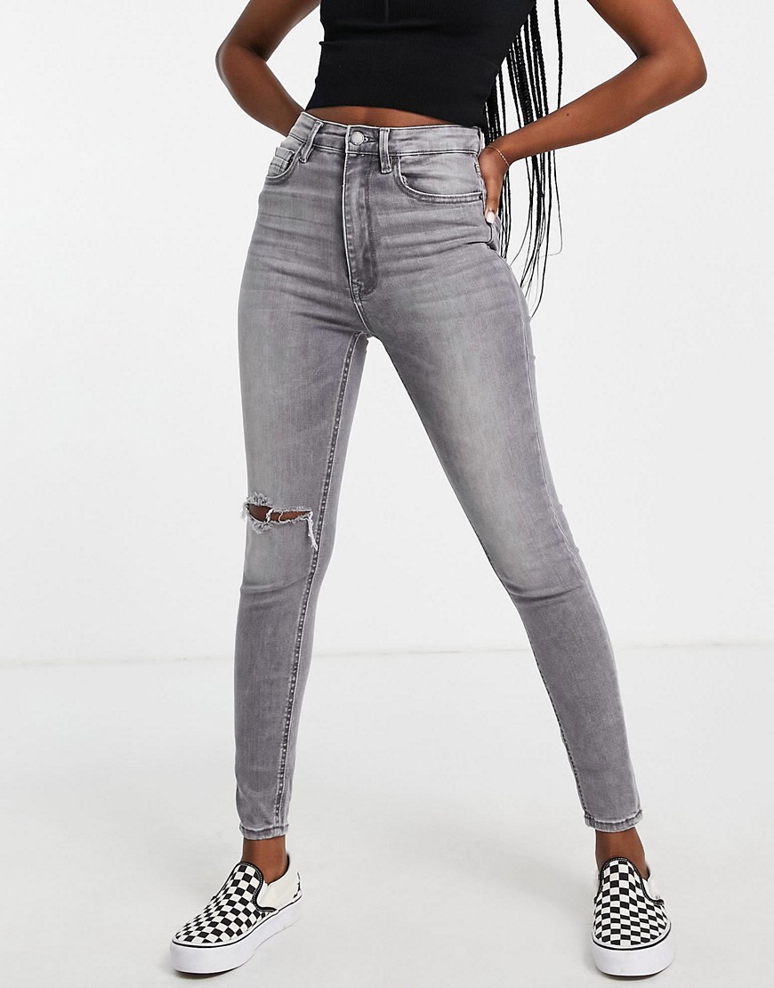 Stradivarius – Jeans in Grau mit engem Schnitt, Rissen und sehr hohem Bund günstig online kaufen