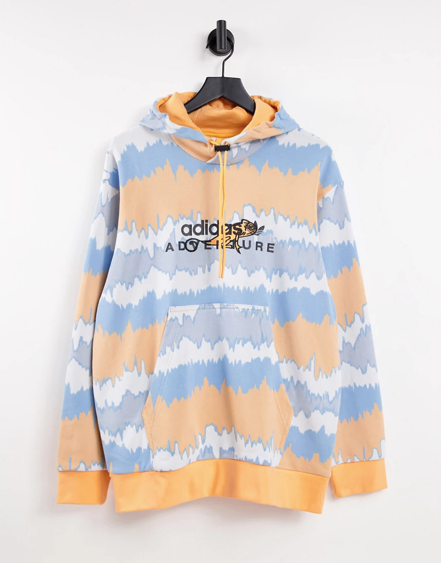 adidas Originals – Adventure – Bunter Kapuzenpullover mit All-over-Print-Or günstig online kaufen