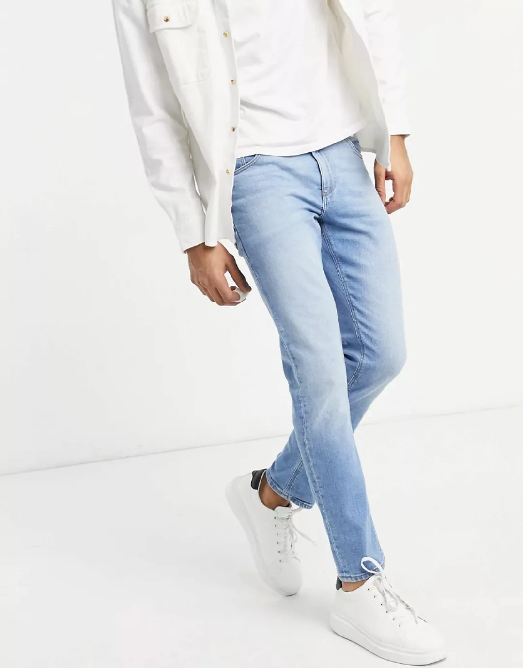 ASOS DESIGN – Schmale Stretch-Jeans in verwaschenem Hellblau günstig online kaufen
