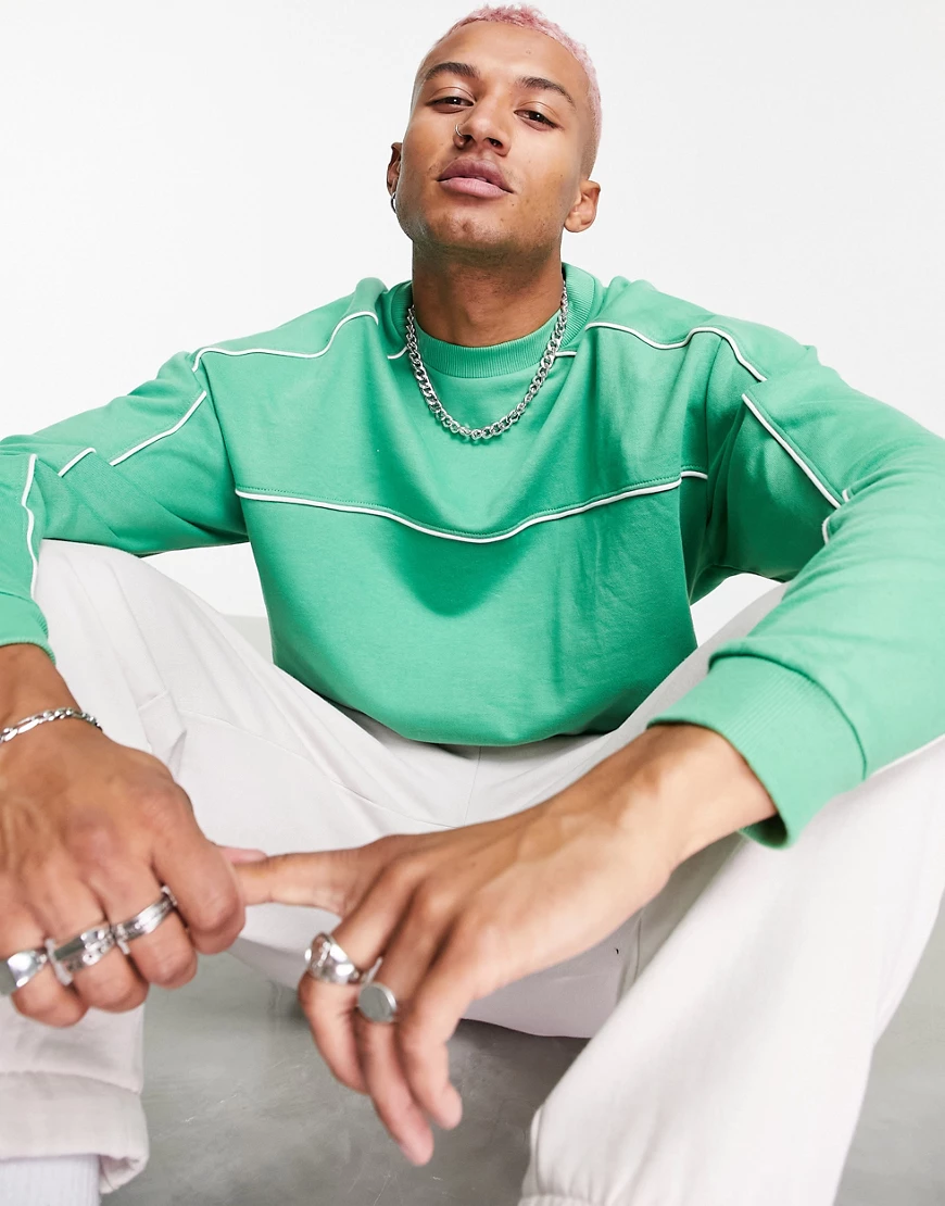 ASOS DESIGN – Oversize-Sweatshirt in Grün mit Paspelierung günstig online kaufen