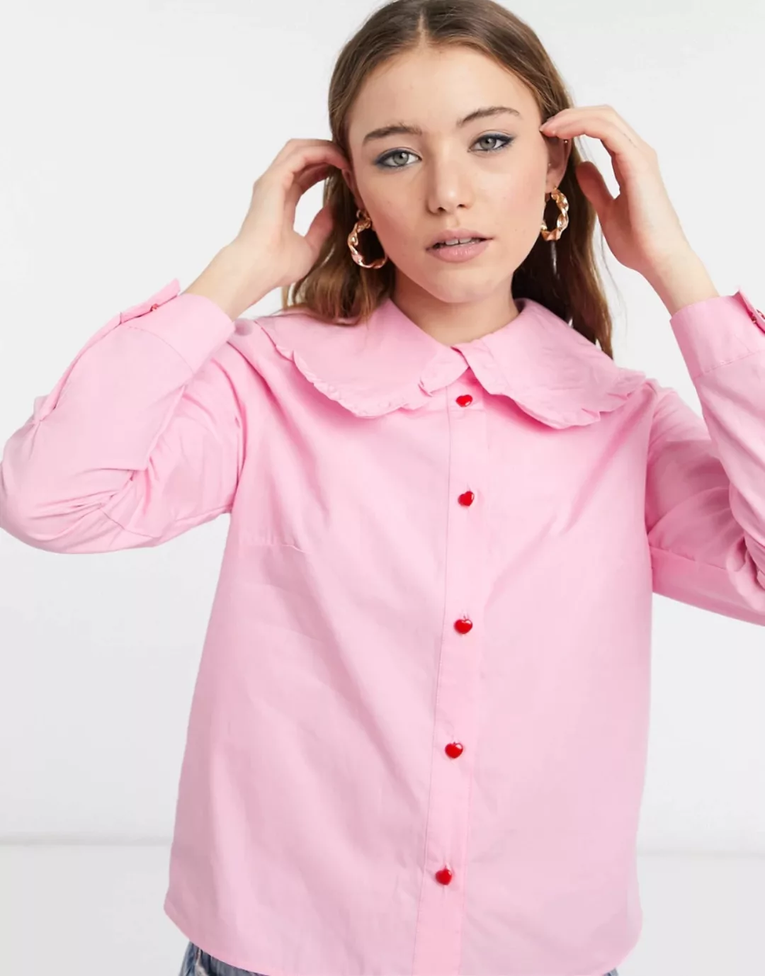 Skinnydip – Rosa Bluse mit Peter-Pan-Kragen und herzförmigen Knöpfen günstig online kaufen