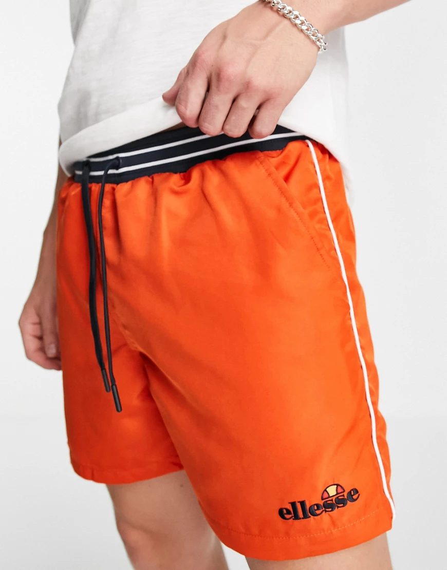 ellesse – Shorts mit kleinem Logo in Orange günstig online kaufen