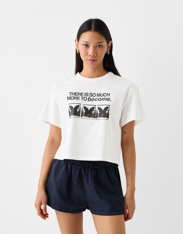 Bershka Cropped-T-Shirt Mit Kurzen Ärmeln Und Print Damen L Grbrochenes Wei günstig online kaufen